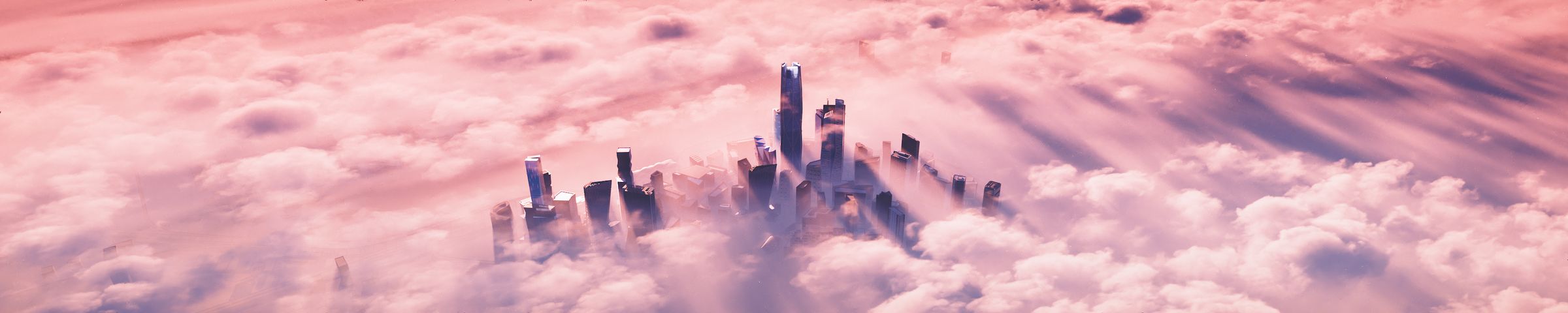 Riyadh's skyline rising through a sea of pink clouds